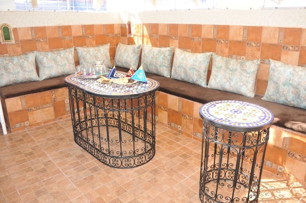 фото Riad Najiba